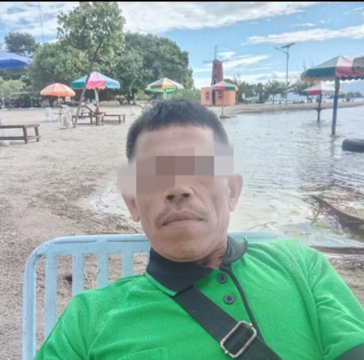 Oknum Ketua Panitia Pilpanag Nagori Pondok Buluh bermarga Nainggolan