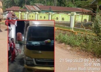 Foto Diduga Gudang tempat penimbunan minyak solar subsidi milik TOM (rumah hijau) di Aek Batu - Labuhanbatu Selatan dan Foto saat truk colt diesel milik TOM saat mengisi solar subsidi di SPBU 14.214.215 Patung Kuda Cikampak - Labuhanbatu Selatan (foto : Dok/Mitrapolri.com)