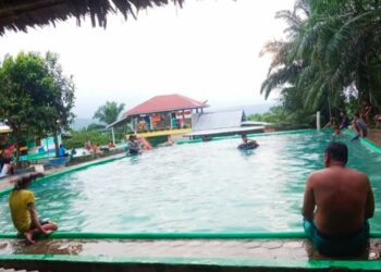 Lokasi Pemandian Wisata Air Panas Kolam Renang Tamsar Desa Durian IV Mbelang Kecamatan STM Hulu, Kabupaten Deli Serdang pada Minggu sekitar pukul 15.00 WIB.