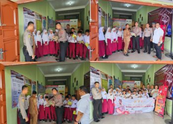 Kapolsek Na IX-X AKP Panji Nugraha,S.T.K.,M.H. beserta Personil dan Siswa Setukpa melaksanakan pembagian buku bacaan di posko KBN Desa Kampung Pajak Kec. Na IX-X, Kab Labura.