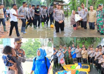 Kapolres Labuhanbatu AKBP James H. Hutajulu beserta Personil turun ke lokasi banjir di Kampung Jati Kecamatan Bilah Hilir, Kabupaten Labuhanbatu, Sumatera Utara.