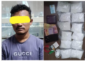 BARANG BUKTI : Calon penumpang Na bersama barang terlarang berupa 12 bungkus serbuk putih yang diduga sabu, Minggu (29/10/2023) malam, di Bandara Internasional Kualanamu. (Foto.Dok/Polda Sumut).