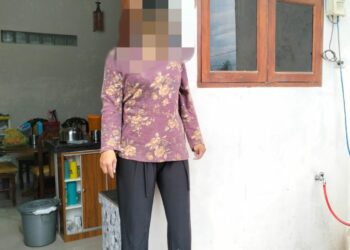 Renova Suryani br. Panjaitan (38) alias korban gantung diri menggunakan tali. Foto: Dok. Istimewa.