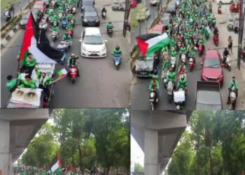 Ribuan driver grab tumpah ruah dijalan memenuhi panggilan aksi peduli palestina. Kota Makassar dihijaukan atas konvoi driver grab dalam rangka kepedulian kemanusiaan terhadap palestina. Selasa, 14/11/2023.