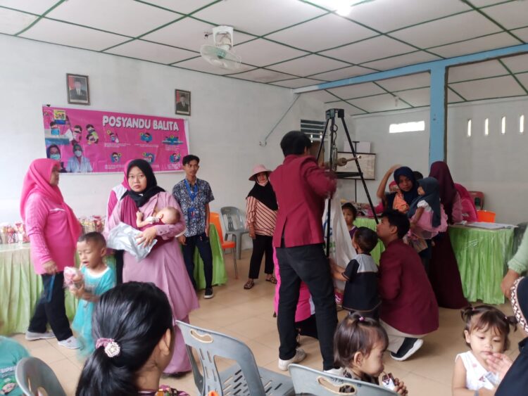 Pemberian Makanan Tambahan Balita Nagori Margomulyo Kecamatan Gunung Malela Kabupaten Simalungun