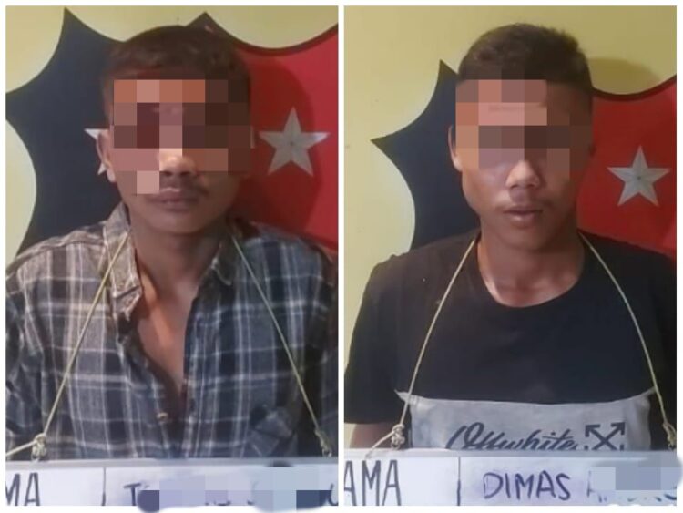 Diamankan : Dua pria warga Padang Lawas Utara, tersangka pelaku pencurian rokok dan uang tunai belasan juta rupiah diamankan di Mapolsek Medan Labuhan, setelah diringkus dari kawasan Medan Amplas, Rabu (31/1/2024).(Foto dok/Polres Belawan)