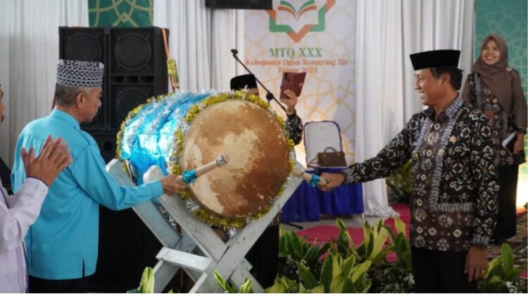 Pj. Bupati Ogan Komering Ilir, Asmar Wijaya saat membuka Musabaqoh Tilawatil Quran ke-30 Tahun 2024, di Kayuagung, (26/2/23).