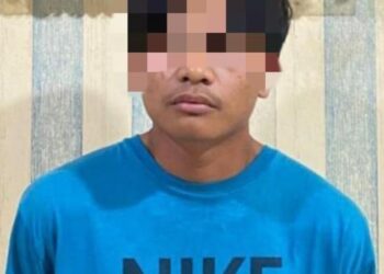 DITANGKAP: Dimas (19) pelaku penganiayaan yang mengakibatkan korban meninggal dunia berhasil ditagkap setelah menjadi buronan selama 1,5 bulan, Senin (26/2/2024). (Foto Dok/ Polres Belawan)
