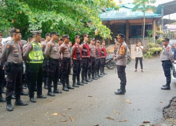 Kapolres Nias AKBP Revi Nurvelani, SH, SIK, MH monitoring rapat pleno rekapitulasi hasil penghitungan perolehan suara di tingkat kabupaten nias barat yang di laksanakan di tokosa hall oleh komisi pemilihan umum (KPU) daerah nias barat dalam pemilihan umum tahun 2024, pada jumat 01/03/2024.