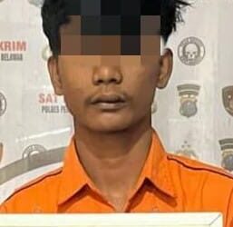 DITANGKAP: Seorang lagi pria, pelaku penganiayaan yang menewaskan Ferdiansyah ditangkap dari kawasan Medan Sunggal, diamanakan di Polres Pelabuhan Belawan, Minggu (3/3/2024).( Foto Dok/Polres Belawan)