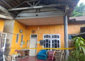 TeWAS: Rumah milik Bima Peranginangin, korban pembacokan oleh 2 perampok hingga tewas yang berlokasi di Jalan Klambir B Kelurahan Tanjung Gusta, Kecamatan Medan Helvetia dipasangi garis polisi guna kepentingan penyelidikan, Senin (18/3/2024).(Foto Dok/Warga)