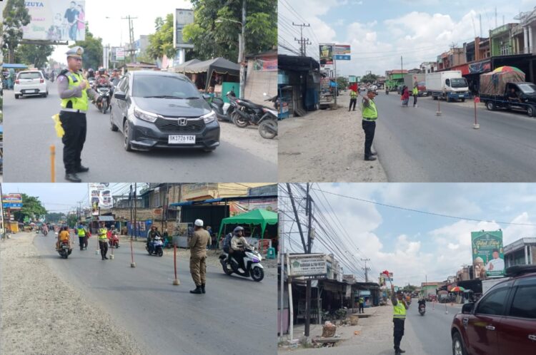 Pos Yan 3 Kampung Pajak Polres Labuhanbatu melaksanakan Pengamanan arus Lalu Lintas di Kampung Pajak Kec. NA.IX-X Kab. Labuhanbatu Utara dalam rangka Ops Ketupat Toba-2024, Senin (15/04/2024).