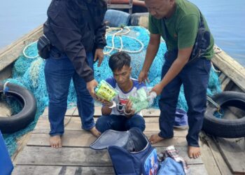 DITANGKAP: Direktorat Polisi Perairan dan Udara (Pol Airud) Polda Sumut menangkap IM (37) di perairan Tanjung Kumpul, Asahan, Jumat (17/5/ 2024). (Foto Dok/ Polda Sumut)