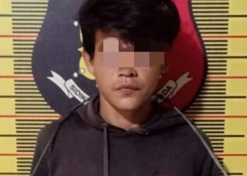 Diamankan : Seorang pria pelaku pencurian sejumlah barang dari toko kelontong di Belawan diamankan di Mapolsek Belawan, setelah ditangkap, Rabu (12/6/2024).(Foto dok/Polres Belawan)
