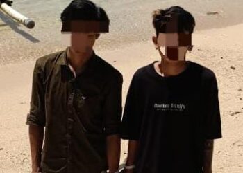dua pemuda, ST (25 tahun) dan AD (20 tahun), yang sedang berdiri di luar acara, terlibat dalam insiden yang memicu kepanikan, Kejadian itu terjadi pada Sabtu (26/8/2024).