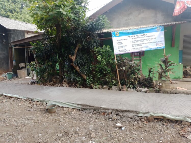 Realisasi Pembangunan Infrastruktur Jalan Desa Kp.Malingpingping sepanjang 150 meter di RT 011 RW 006 Desa Mampir Kecamatan Cileungsi Kabupaten Bogor. (Foto. Dok: RH/Mitrapolri.com)