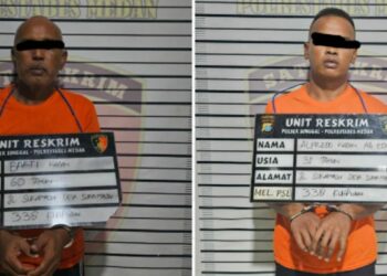 DITANGKAP: BK dan anaknya, AK alias E diamankan di Polsek Medan Sunggal usai membunuh Martius Ginting, Senin (6/1/2025).(Foto Dok/Polsek)