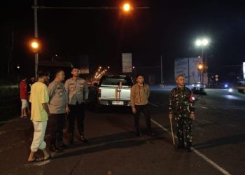 aparat gabungan dari Polsek Mapanget dan TNI-AD bergerak cepat mengamankan lokasi pada Selasa malam (18/3/2025).
