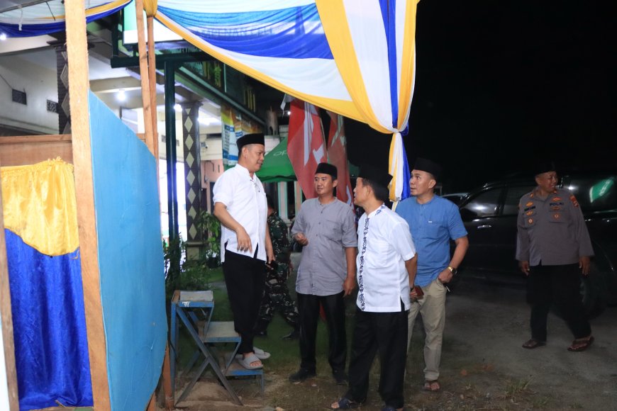 Pj Sekkab Pesisir Barat Kunjungi Pembangunan Posko Mudik Lebaran 2025