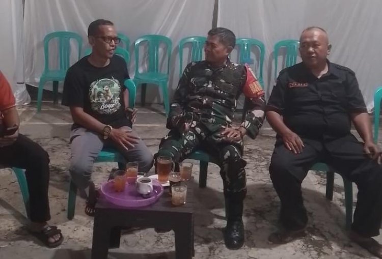 Babinsa Tanah Baru Gelar Patroli Siskamling Bersama Warga