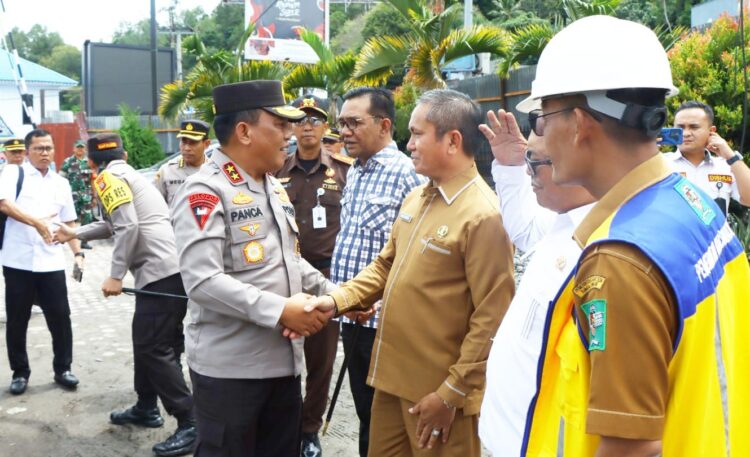 Mewakili Bupati Simalungun, Sekda Hadiri Peletakan Batu Pertama Pembangunan Mapolsek Parapat.