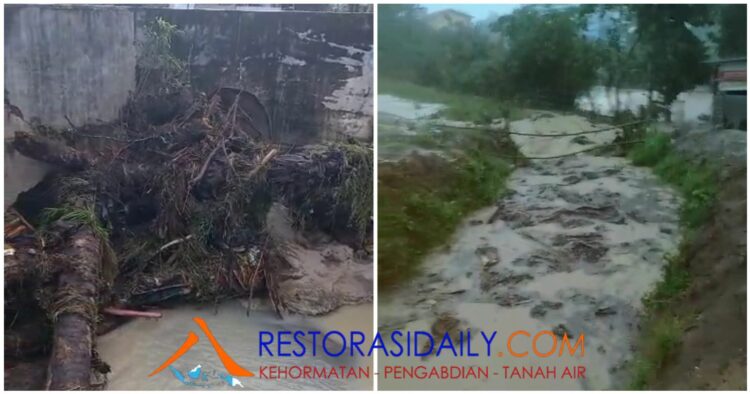 Parit Isolasi dan Batang Pohon Sawit Sisa Replanting Kebun Marihat Diduga Penyebab Banjir di 2 Nagori