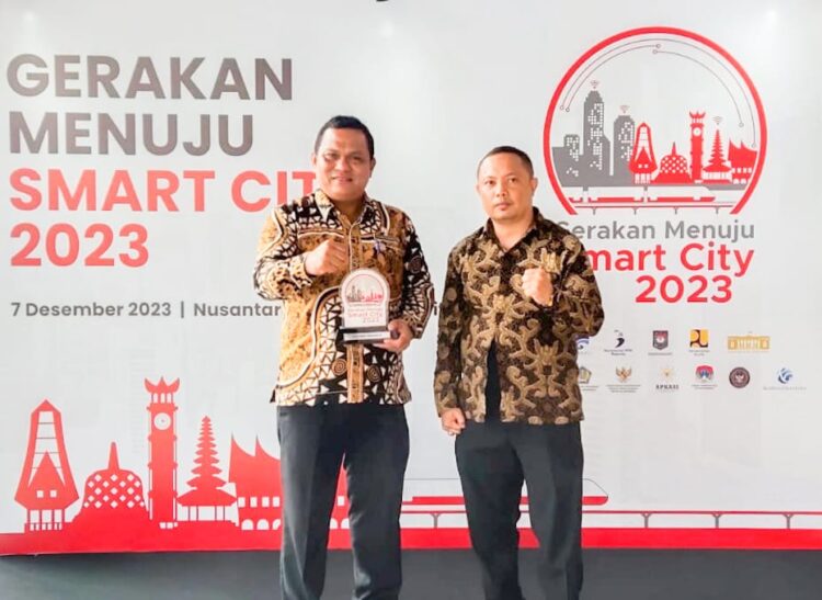 Kadis Kominfo Pematang Siantar Hadiri Acara Forum Smart City Nasional
