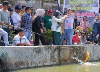 Susanti Dewayani Hadiri Lomba Memancing di Kolam Balai Benih Ikan Pematangsiantar