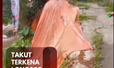 Cerita Warga Rancamaya Menutup Tebing Yang Longsor Hanya dengan Terpal.