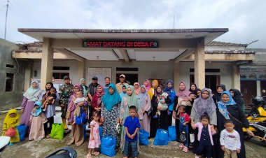 Babinsa Desa Pangkalan Hadiri Pendistribusian Bantuan Pangan dari Dinas Ketahanan Pangan