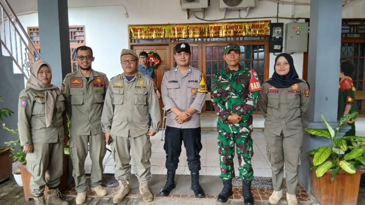 Babinsa Koramil 2204/Cikidang Laksanakan Pengamanan Natal di Gereja HKBP  Bangun Sinergitas TNI-Polri