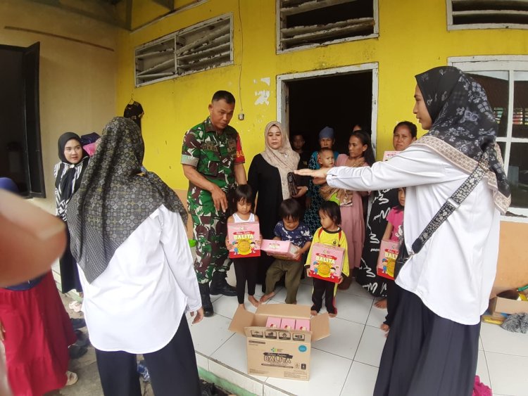 Babinsa Citarik Dampingi Bidan Desa dalam Pemberian PMT untuk Balita