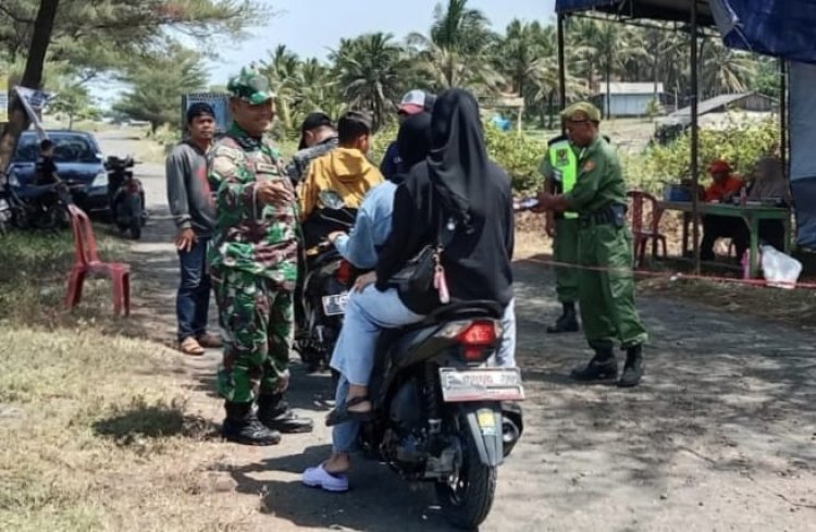 Babinsa Koramil 2212/Tegalbuleud Laksanakan Pengamanan Wisata di Muara Cikaso