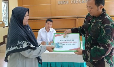 BABINSA KORAMIL 2204/CIKIDANG LAKSANAKAN PENDAMPINGAN PENYALURAN BLT-DD DI DESA CICAREUH