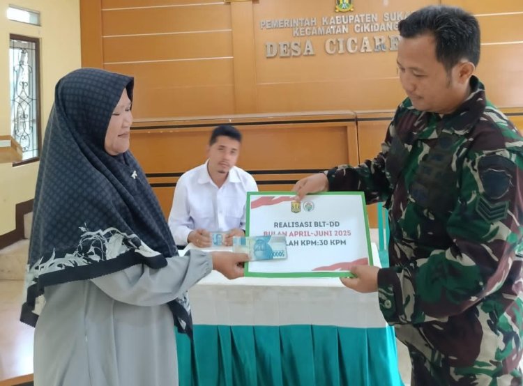 BABINSA KORAMIL 2204/CIKIDANG LAKSANAKAN PENDAMPINGAN PENYALURAN BLT-DD DI DESA CICAREUH