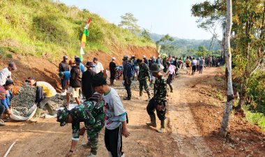 SATGAS TMMD KE-125 TERUS PACU PENGASPALAN JALAN DEMI AKSESLITAS WARGA