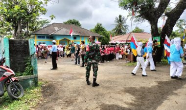 Babinsa Koramil 2213/Jampang Kulon Laksanakan Pengamanan Karnaval HUT RI ke-80
