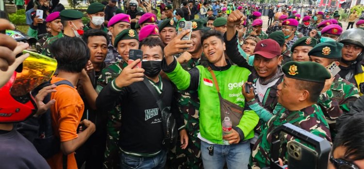 Redam  Aksi Massa Prajurit TNI Laksanakan Aksi Humanis