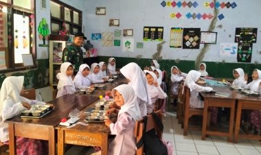 Babinsa Koramil 2210/Pabuaran Dampingi Kegiatan Makan Bergizi di Kecamatan Pabuaran