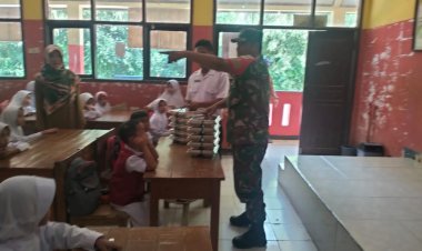 Babinsa Koramil 2206/Parakansalak Dampingi Pendistribusian MBG di SDN 2 Parakansalak