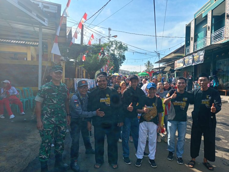 Babinsa Koramil 2211/Sagaranten Laksanakan Pengamanan dan Hadiri HUT ke-42 Desa Pasangrahan