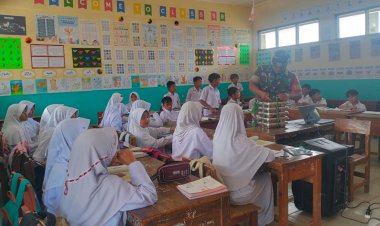 Babinsa Koramil 2206/Parakansalak Dampingi Pendistribusian Makanan Bergizi di SDN Lebaksari