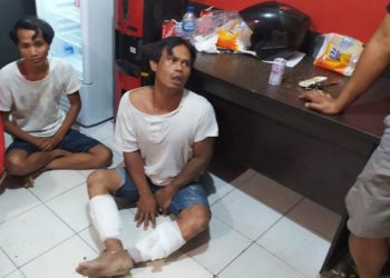 Tim Macan Polresta Barelang meringkus 2 orang pelaku pencurian dengan kekerasan, yakni Indra Junaidi (34) dan Alek Iskandar (35) di kawasan Nagoya, Batam. Foto/iNews TV/Gusti