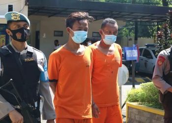 Dua pelaku pembunuh dan pemerkosa pemandu lagu di Malang diamankan. (Foto: Okezone/Avirista Midaada)