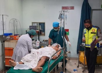 Korban Aditya Yarman Saragih saat dirawat di RS Vita Insani Siantar akibat kecelakaan.