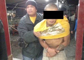 Tersangka Dedek Kurniadi (30) saat diamankan di Polsek Tigapanah. (Foto: istimewa)