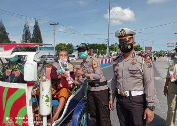 Suasana Ops Keselamatan Toba 2021 di Jalan Besar Raya - Saribu Dolok, depan Hotel Simalungun City Kecamatan Raya, Kabupaten Simalungun, Senin (19/4/2021) pagi, pukul 09.00 WIB.