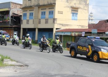 Patroli skala besar yang digelar Polres Pematangsiantar dengan melibatkan TNI dan Brimob, Kamis (29/4/2021).