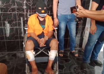 Tersangka JL saat diamankan di Mapolres Asahan. (Foto: iNews/Ulil Amri)