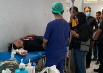 Polisi melakukan pengejaran pelaku penyerangan seorang wartawan di Gorontalo, Jumat (25/6/2021). Korban Jefri Rumampuk diserang OTK ketika sedang membonceng istri. Foto: iNews.id/Subhan Sabu